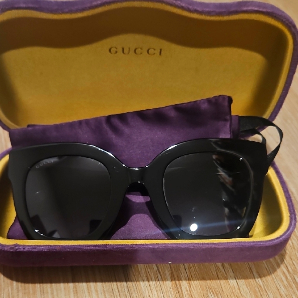 Oversized Black Sunglasses with Bold Design and Purple Case
